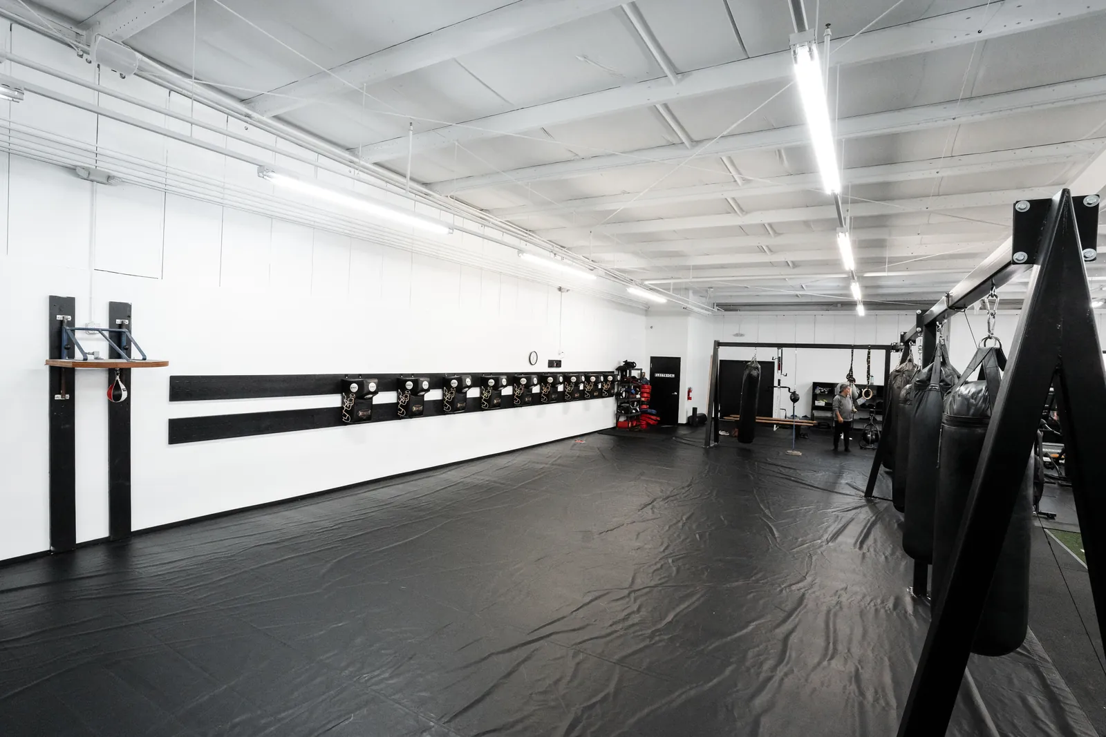 Cage and combat mats — Mezger Martial Arts at Hidden Gym Richardson
