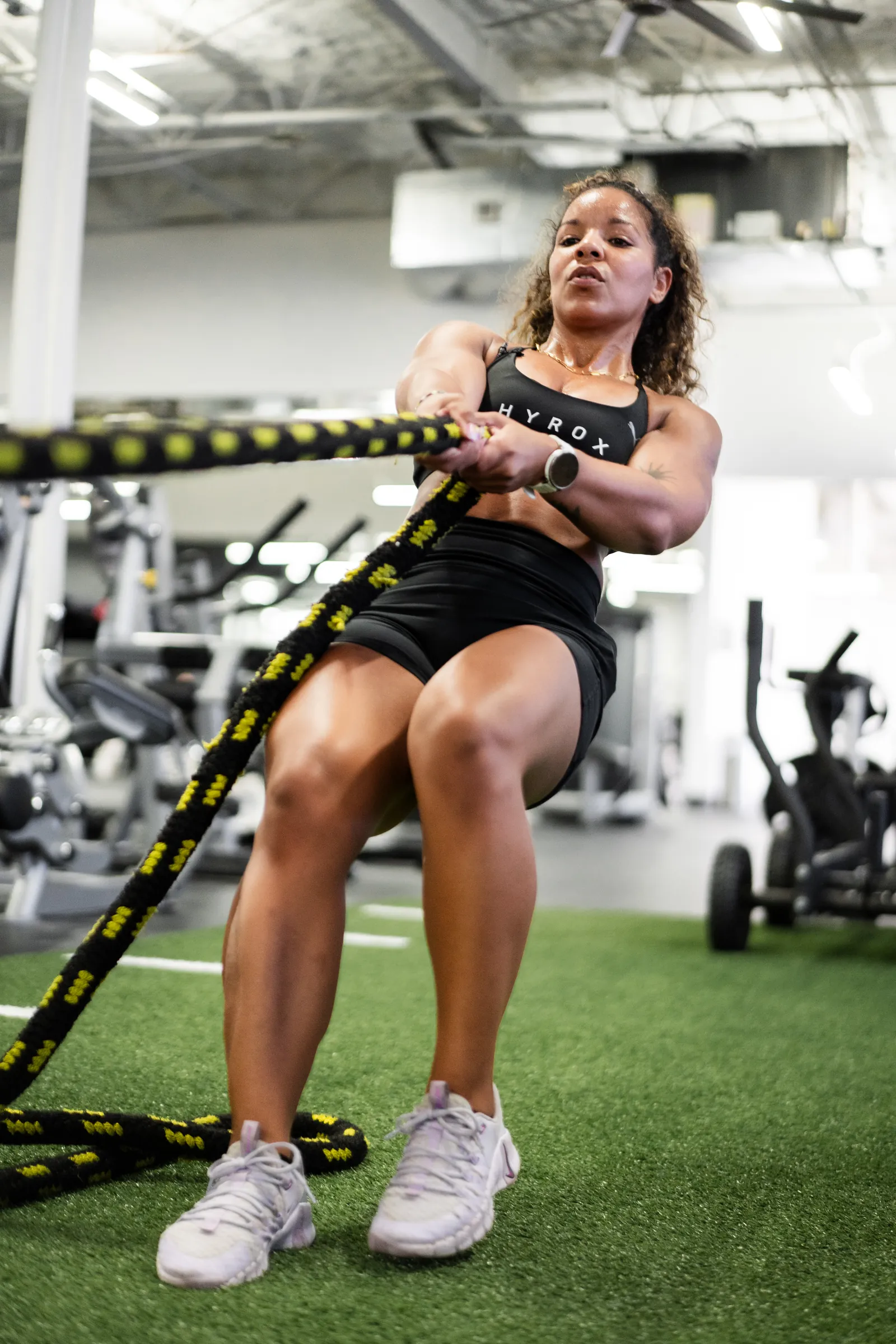 Shelly Reynolds, HYROX Director, on the sled pull at Hidden Gym Allen