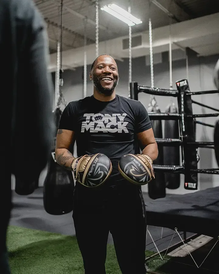 Tony Mack, head boxing coach, in the ring area at Hidden Gym Allen